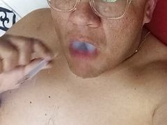 Chubby bator mexican smoking and playing in hotel