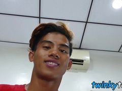 Cute little Asian twink enjoys toying with his cock and feet