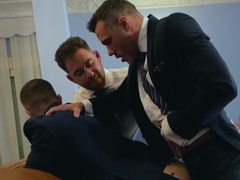 Appealing men in sexy suits are enjoying the best gay threesome