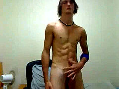 scorching Surfer guy wanking his large manstick.