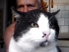 Victor is at home with a cat whose name is Chita