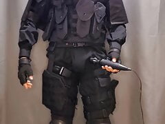 SWAT soldier having fun with cock and vibrator