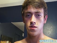 Good looking college twink rubs his big dick and cums solo