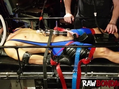 Dungeon master punishes jock Devin Franco in gas mask and cock pumping