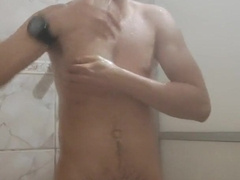 Taking a douche and recording bare