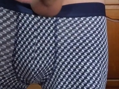 plump fellow strokes his gigantic beef whistle