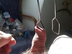 Three minutes of foreskin stretch in sunlight: tongs