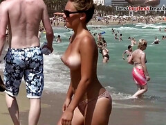 Gorgeous boobs Topless on the Beach