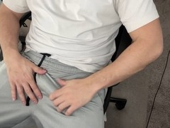 Guy in gray sweatpants gets off using a fleshlight