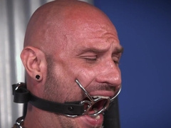 BDSM video with a dominant black man and a bald fella