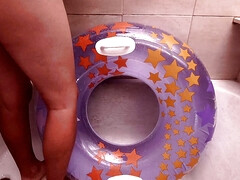 Bathroom with inflatable swim ring