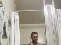Muscle Strength Bottom Showering in Gym Bathroom