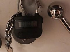 Chastity cage unlocking with time lock