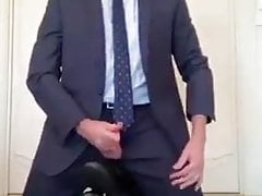 suited fag eats his cum shake