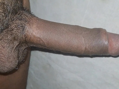 Desi Indian Guy Demonstrating his Immense Trunk in Public.