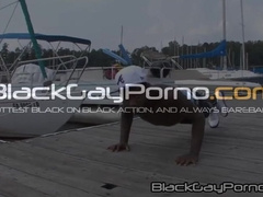 Dallas Knight and Thugzilla show off their mighty fine bods while driving on a boat