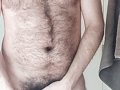 Hairy boy unlocking and relocking his cock in chastity