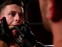 Stud with tattoos is having his way with a horny bottom