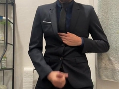 Jacking off with suit on
