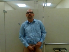 Tugging in a public rest room