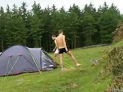 Two straight friends playing with their cocks at the camping