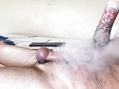 Hot tattooed Richard RiXXX stroking big cock blowing clouds