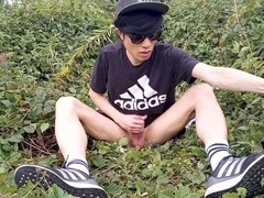 Jon Arteen, an adventurous Asian twink, rocks an Adidas tee, casual pants, white socks and kicks