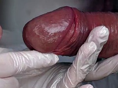 Super close-up handjob in white latex gloves with commentary