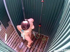 Brunette MILF Showering in Public Pool