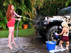 Bossy redhead MILF licks a petite teen pussy outdoor