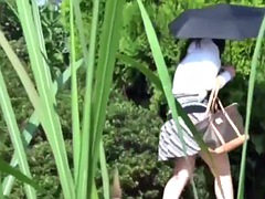 Asian pees in public park