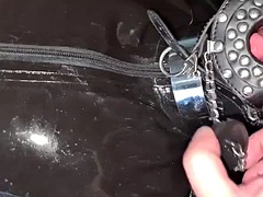 Slave Slut-Orgasma Celeste restrained in latex and leather