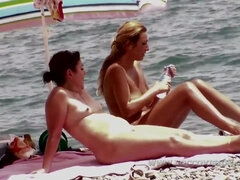 Naked MILFs on the beach - voyeur video