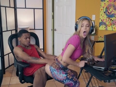 Ebony guy is fucking white chick while girlfriend is playing game