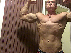 Alpha Muscle God flexes unbelievable muscles