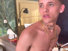 Cute teen latino boy doing striptease in shower