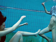 Two hot lesbians in the pool