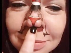 Dancing Santa on girl's nose