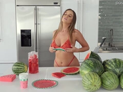 Lovers make anal sex right on watermelons in kitchen