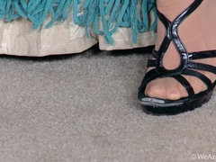 Valentine touches and spreads her pussy on sofa