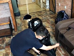 The girl struggled in the trash bag.