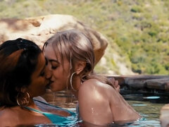 Roxie Sinner and Chloe Surreal lovemaking in the swimming pool