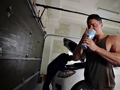 Stud auto mechanic with a big cock fucks a muscular bottom bareback