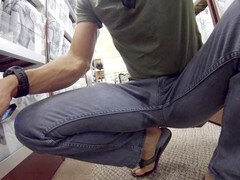 Hunky muscle guy Lapetus gets off in the mall while soaking his jeans