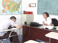 Music teacher Alexis Silver riding skin flute in the classroom