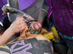 Inked submissive fellow double-pegged into submission by 2 relentless dommes