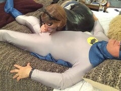 Batman and Catwoman in a wet and wild blowjob session