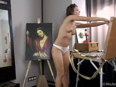 Simona finishes painting and strips naked by easel