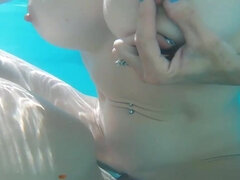 Underwater fuck with a big boobs brunette babe