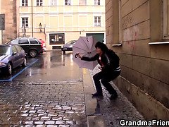 Hairy old woman spreads legs for two strangers